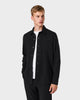 OS 01 Essence Black – overshirt in black stretch twill