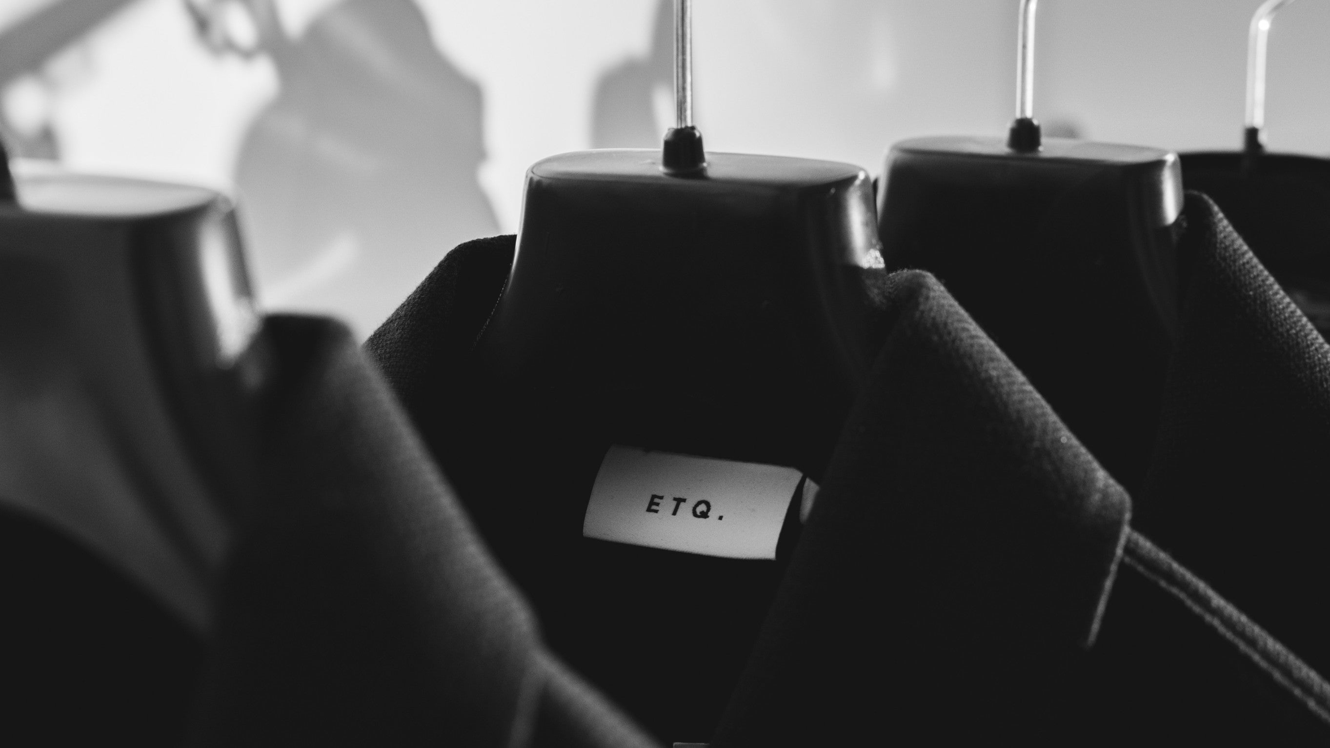ETQ. jackets on a rail
