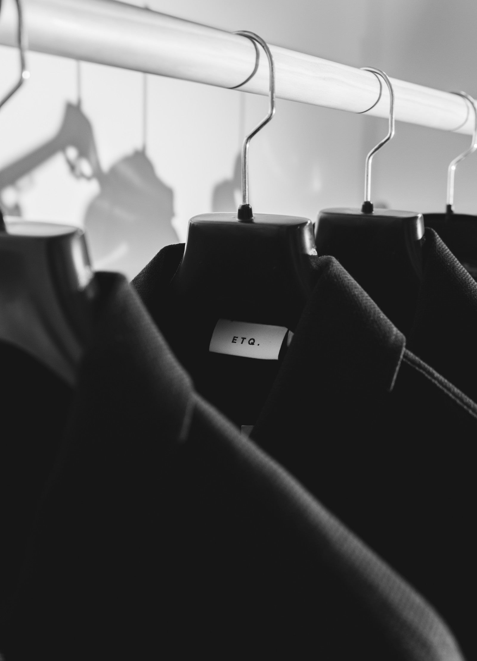 ETQ. jackets on a rail